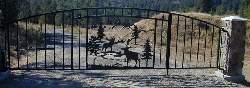Ornamental Gate With A Elk Scene